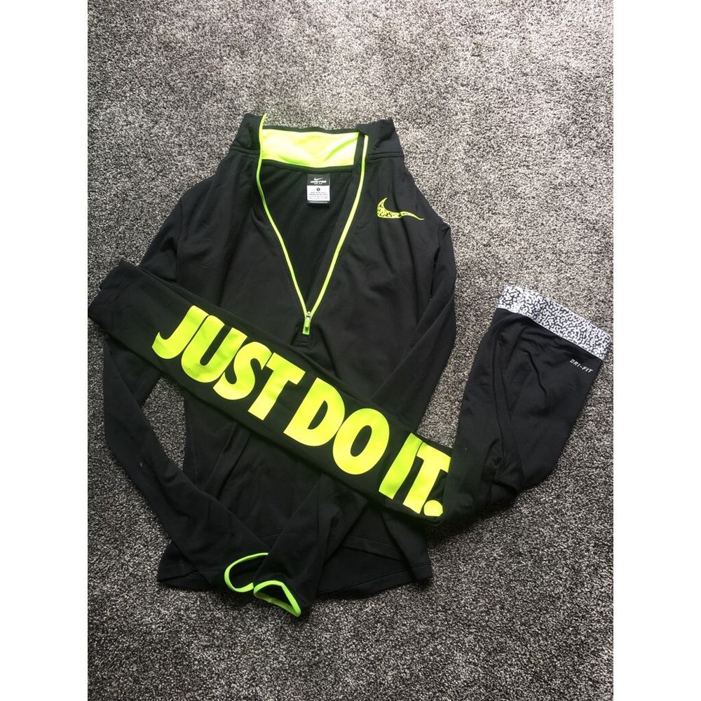 Neon yellow and black Nike top and bottom set.